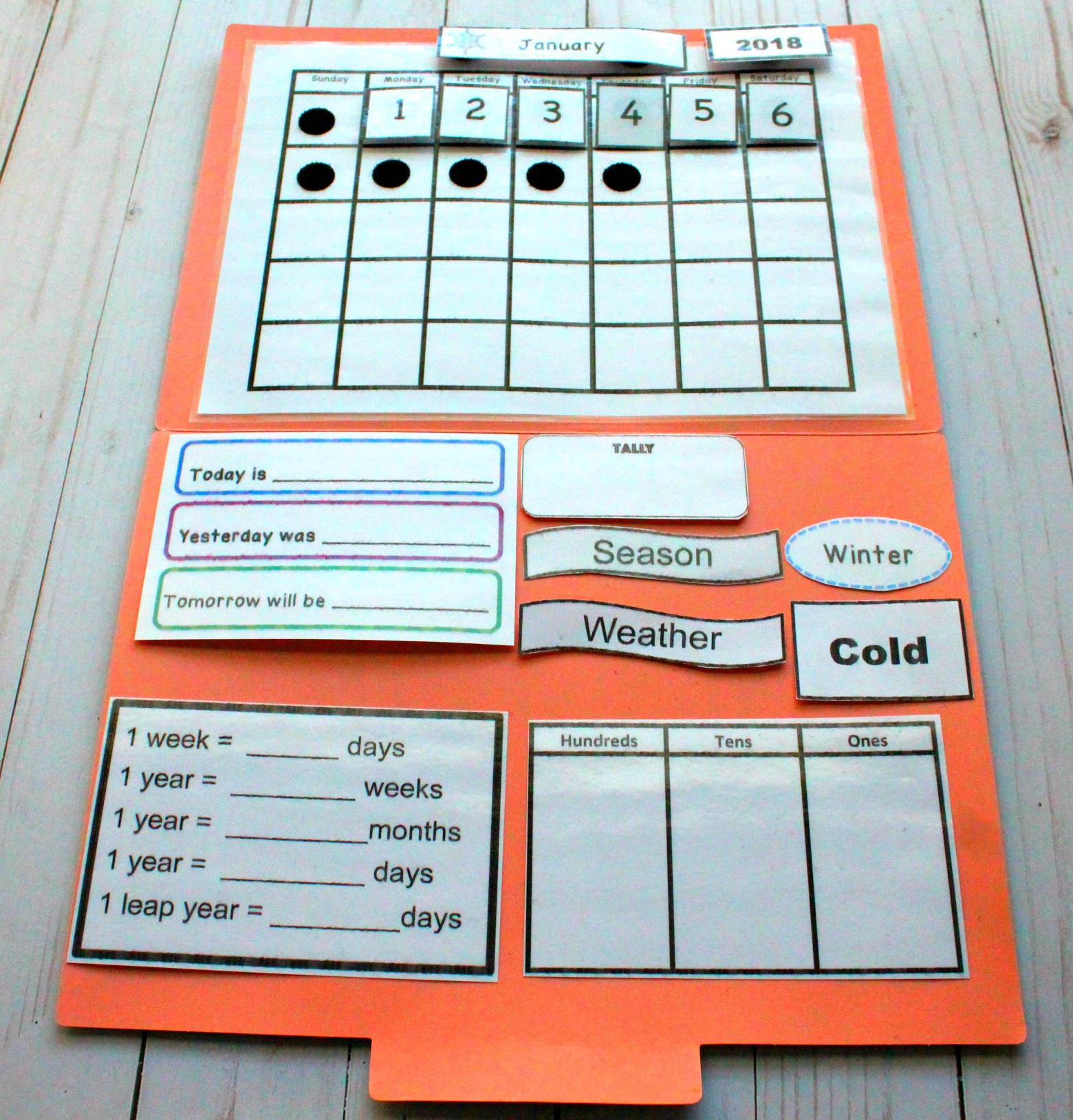 If you are teaching your children about the calendar this is perfect for small spaces or to just pull out to work with your child one on one with. Inside you will find the calendar template, numbers, weather cards, season cards and so much more. This really is an amazing packet. 
